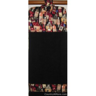 bottled wine black oven door kitchen tea towel